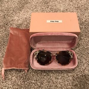 Miu Miu Women’s sunglasses